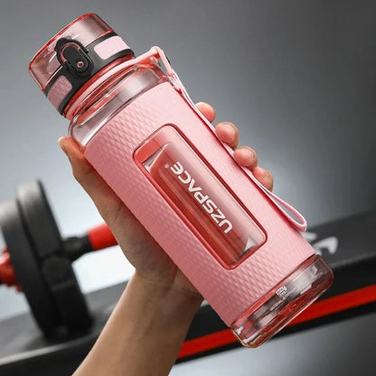 Portable sports water bottle with wide mouth, tea infuser, and leak-proof design for active lifestyles