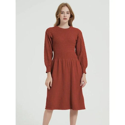 Elegant long sleeve knitted sweater dress in purple red with a classic A-line silhouette and mid-calf length