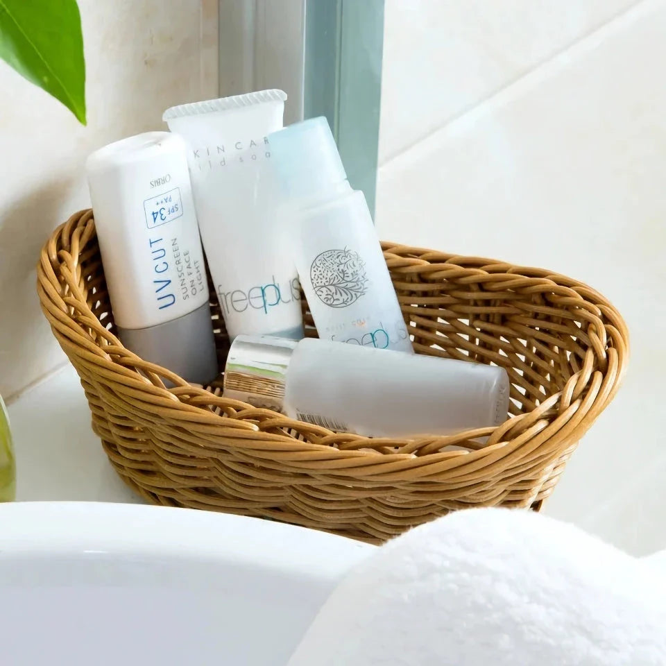 Bamboo handwoven storage basket organizer with natural, neutral tones and rustic design for organizing fruits, tea supplies, and more in the kitchen, living room, or bathroom.