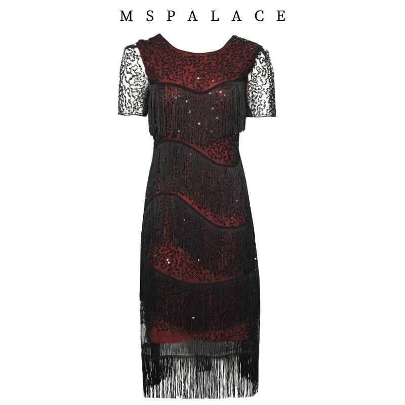 A glamorous Gatsby-inspired party dress adorned with shimmering sequins and flowing tassels, perfect for special occasions and dance floors.