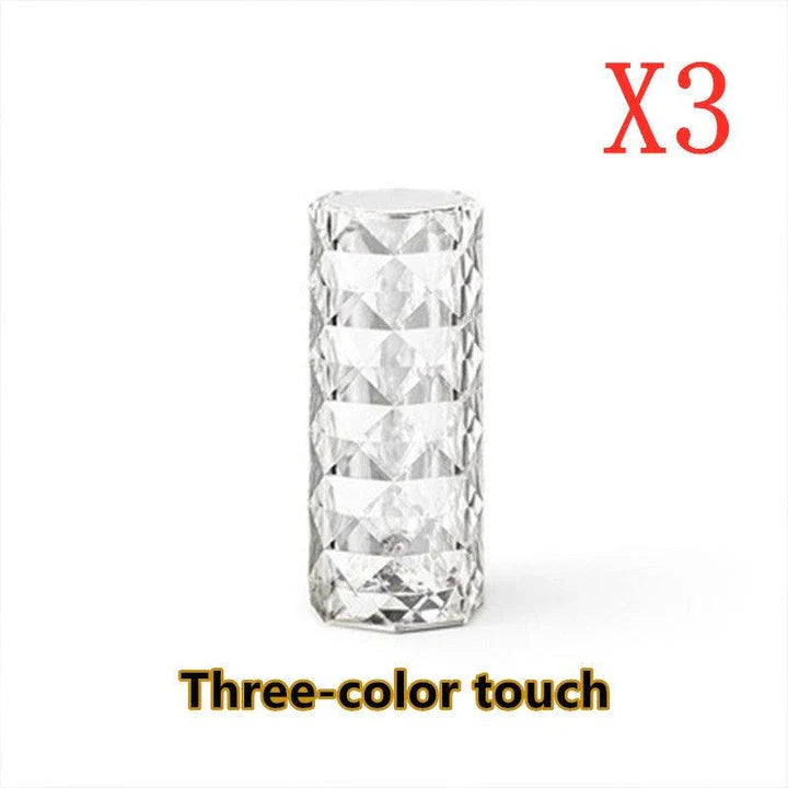 Elegant diamond-inspired crystal lamp with touch-sensitive dimming controls, providing adjustable ambient lighting for bedrooms and living spaces.