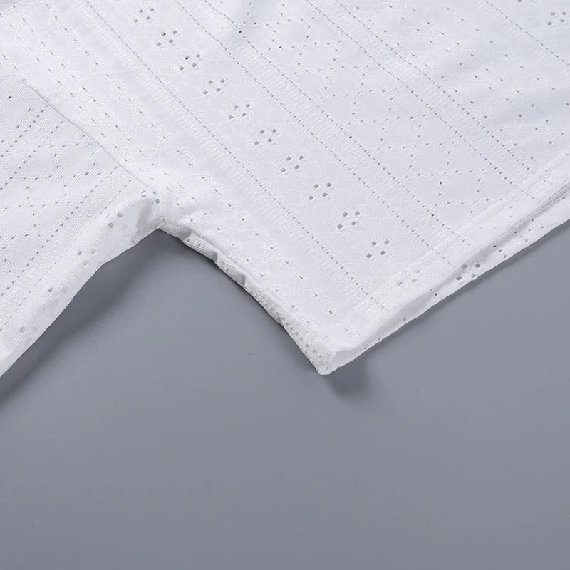 Trendha Women's Long Sleeve Pullover Top and Shorts Set in White, featuring a chic hollow-out design and flattering slim fit