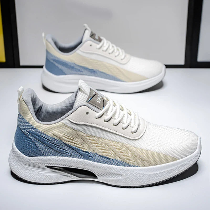 Breathable, comfortable color-blocked mesh sneakers for men with a durable rubber sole and secure lace-up closure