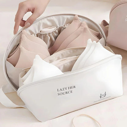 Compact travel underwear and lingerie organizer bag made of durable polyester for organized storage of bras, underwear, and socks while on the go.