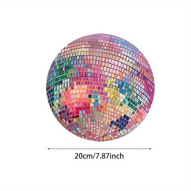 Dazzling pink disco ball-patterned mouse pad with a smooth, rubber surface and non-slip base for a stylish and functional desk accessory.