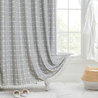 Elegant jacquard linen shower curtain with charming tassels in light grey color, adding sophisticated style to any bathroom