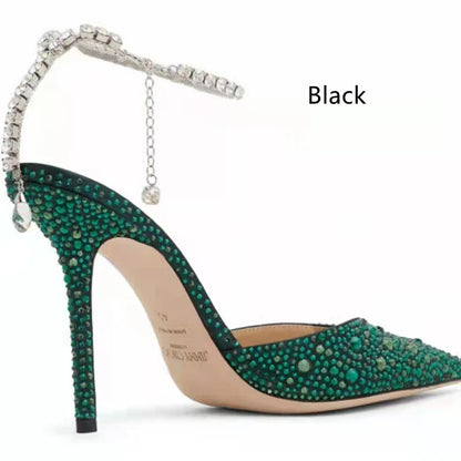 Glamorous rhinestone-embellished stiletto sandals in black and green colors, featuring a pointed toe and sleek silhouette