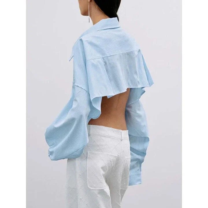 Chic patchwork blouse with functional pockets, perfect for casual and semi-formal occasions