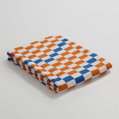 Cozy and stylish plaid blanket in blue, perfect for home decor, travel, and outdoor activities