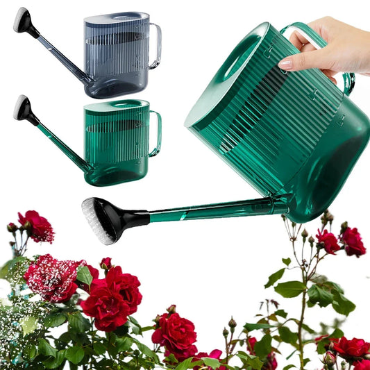 A large, dark grey gardening watering can with a long spout and sprinkler head for efficient, hassle-free plant watering