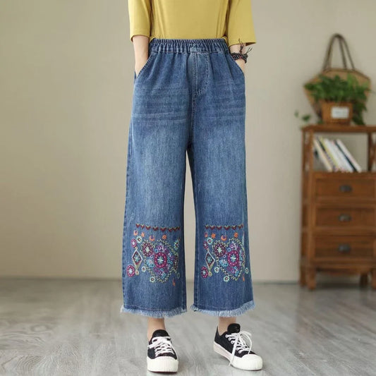 Fashionable embroidered ripped denim straight jeans with a relaxed yet flattering silhouette