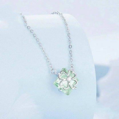 Elegant platinum-plated adjustable green pendant necklace with a sleek, silver-toned chain and a stylish green pendant
