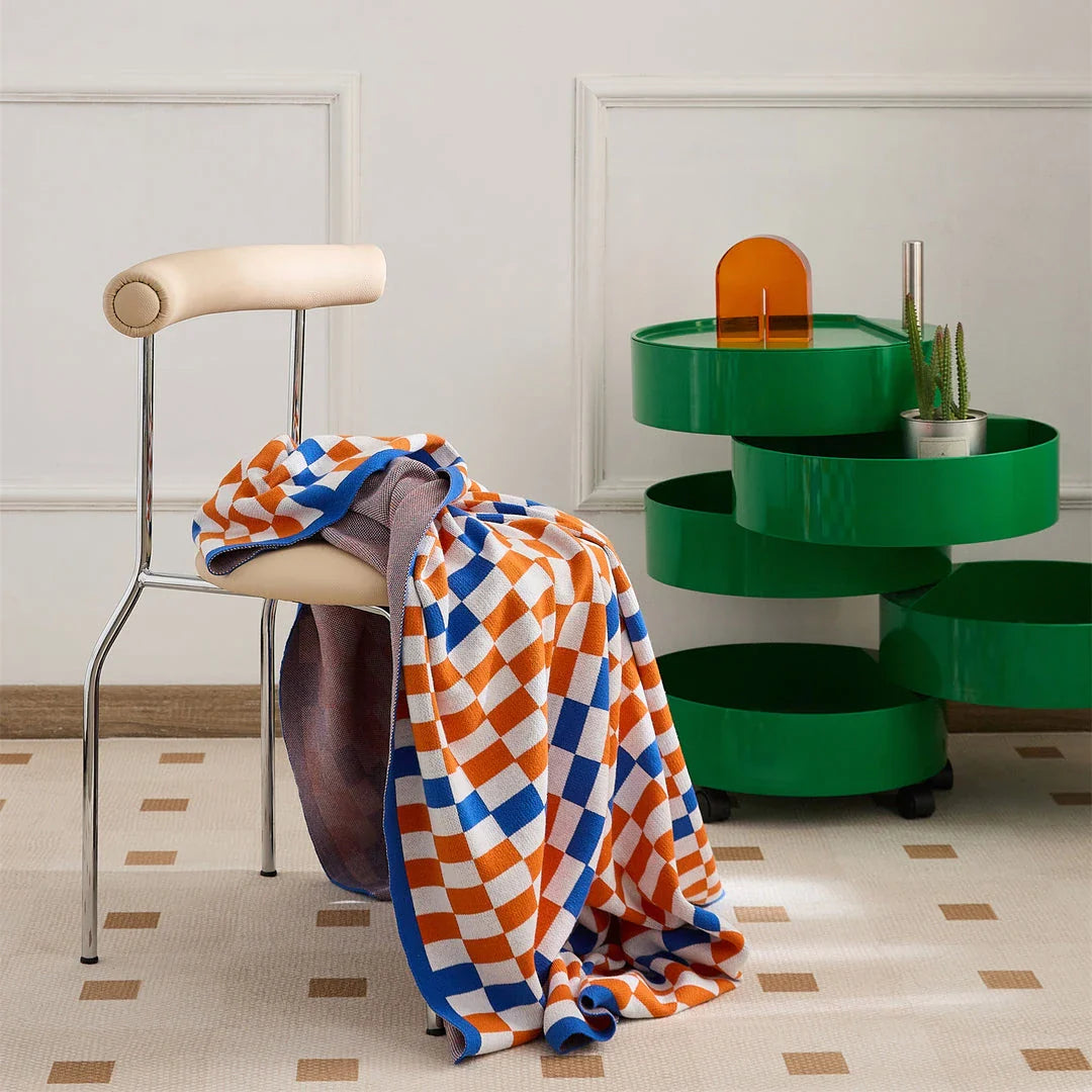 Cozy and stylish plaid blanket in blue, perfect for home decor, travel, and outdoor activities