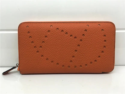 Premium cowhide leather clutch bag with lychee pattern design, featuring a medium-sized square shape and versatile style