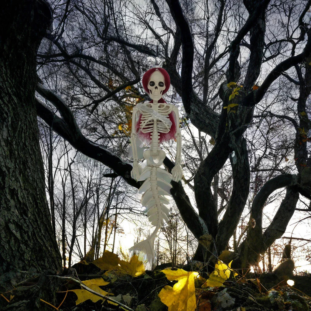 Mermaid bone pendant in various colors, including brown, dark purple, burgundy, and lake blue, hanging outdoors for Halloween decoration