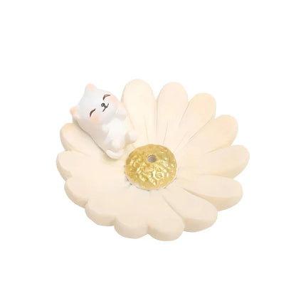 Elegant mini resin incense holder with cherry blossom, water lily, plum blossom, and daisy motifs for calming aromatherapy experience