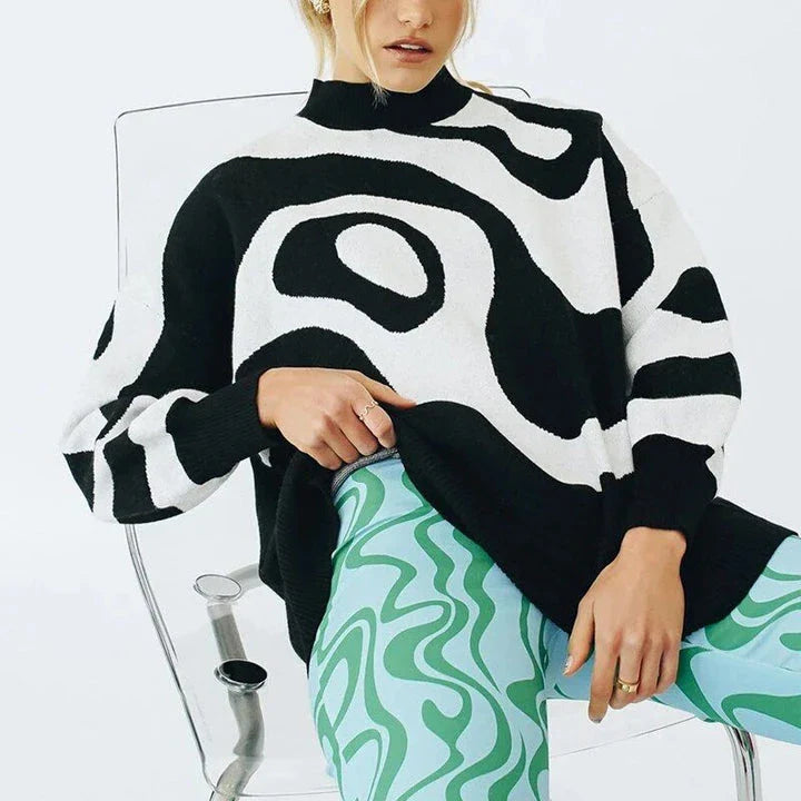 A woman wearing a stylish, striped turtleneck oversized sweater in a relaxed, comfortable fit.