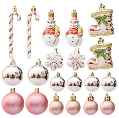 Rose gold Christmas ornaments in a gift box, including gourds and candy canes, for elegant holiday decor