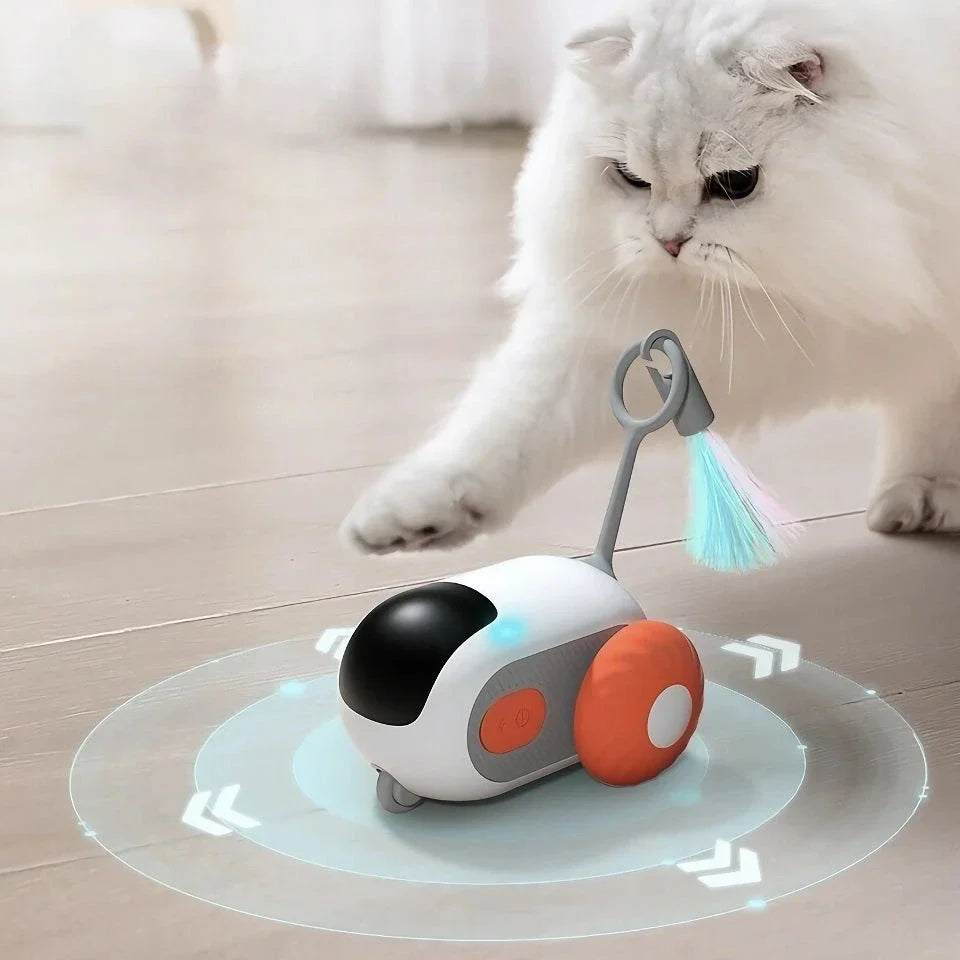 An orange remote-controlled rolling car toy with blinking lights, designed to captivate and entertain cats and kittens.