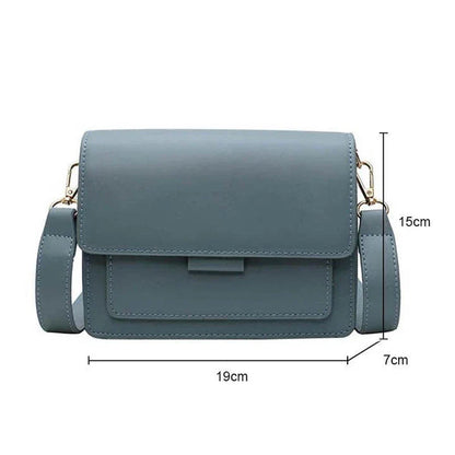 Stylish black crossbody shoulder bag with adjustable strap and multiple interior compartments for modern women