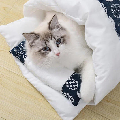 Cozy cat cave bed with a printed design, providing a plush and secure retreat for your feline friend.