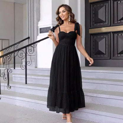Fairy-inspired dress with mid-length silhouette, lace-up details, and luxurious polyester fabric
