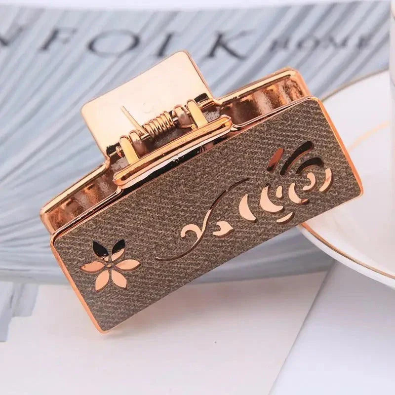 Elegant floral hair claw accessory for women, featuring a premium canvas and rubber design in a stylish brown color