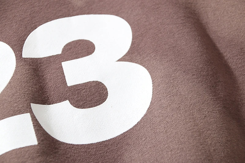 Cozy loose knit sweaters in a rich coffee color with a relaxed, oversized fit for ultimate comfort and style.