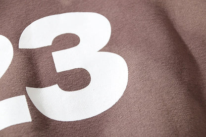 Cozy loose knit sweaters in a rich coffee color with a relaxed, oversized fit for ultimate comfort and style.