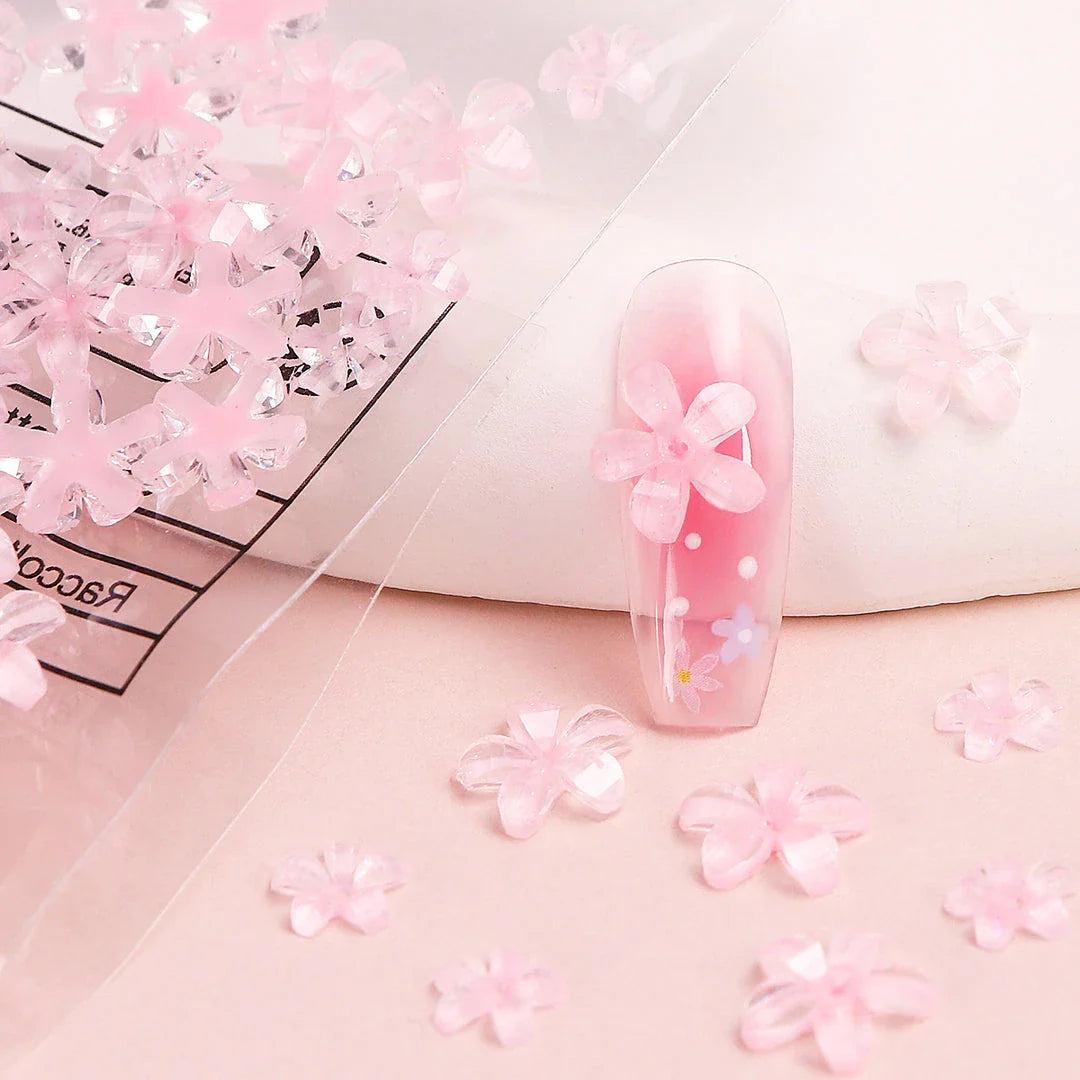 Transparent jelly 3D flower nail charms with rhinestone accents for elegant and charming nail art designs