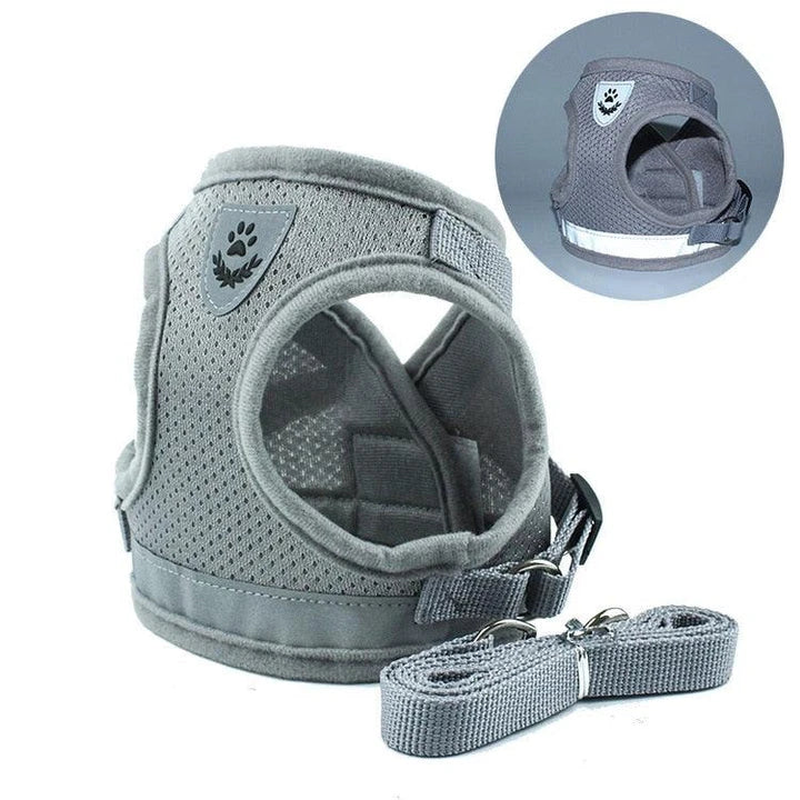 Adjustable reflective dog harness made of durable polyester material with reflective strips for enhanced visibility and safety during outdoor activities.
