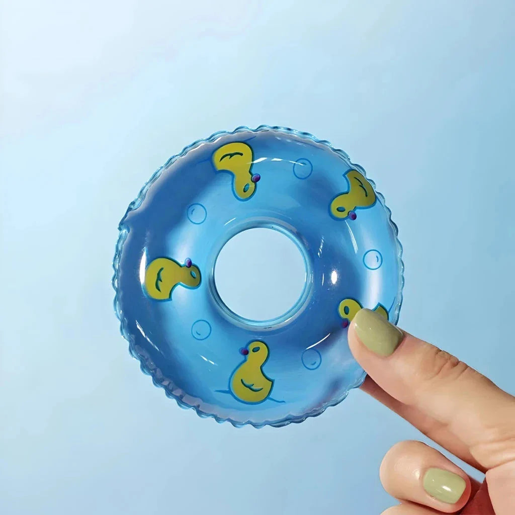 Colorful inflatable swim rings designed to float and entertain children during bath time and pool activities