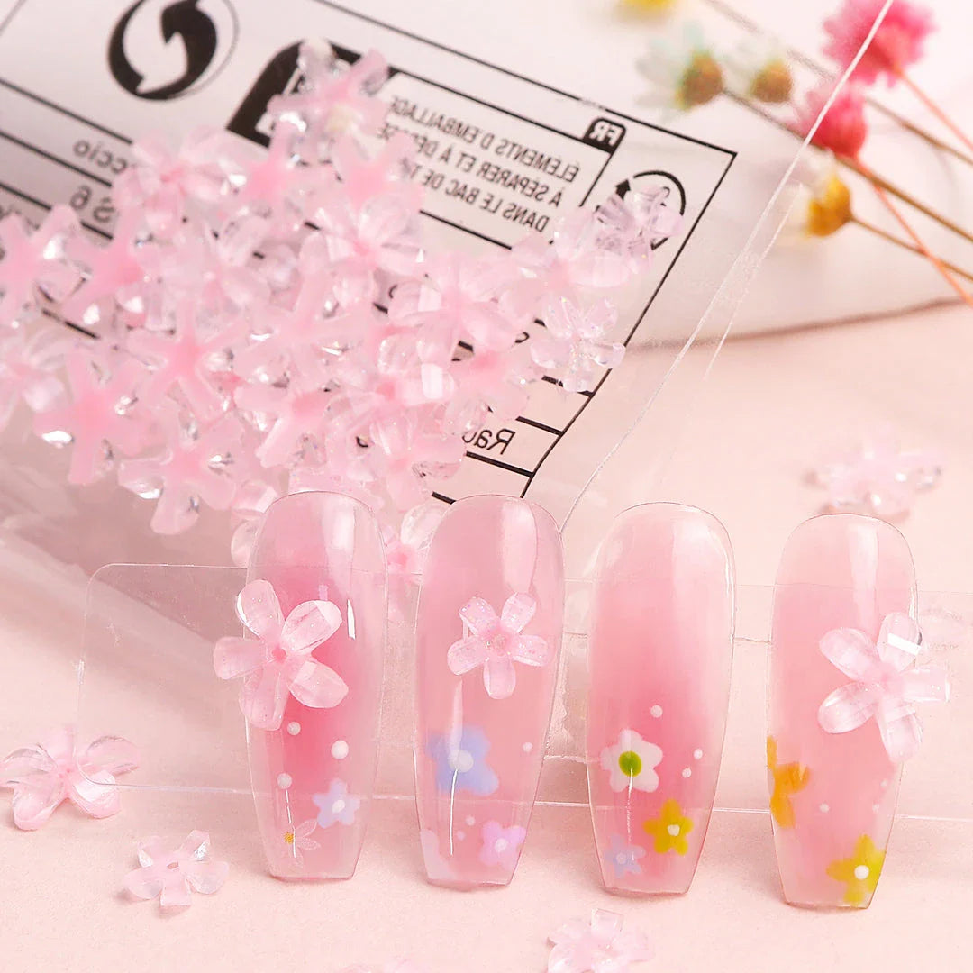 Transparent jelly 3D flower nail charms with rhinestone accents for elegant and charming nail art designs