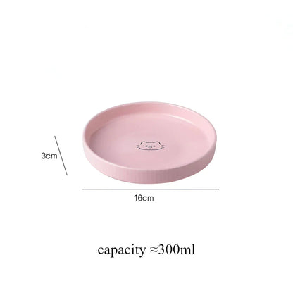 Adorable ceramic pet food and water bowl in pink color, perfect for cats and small dogs