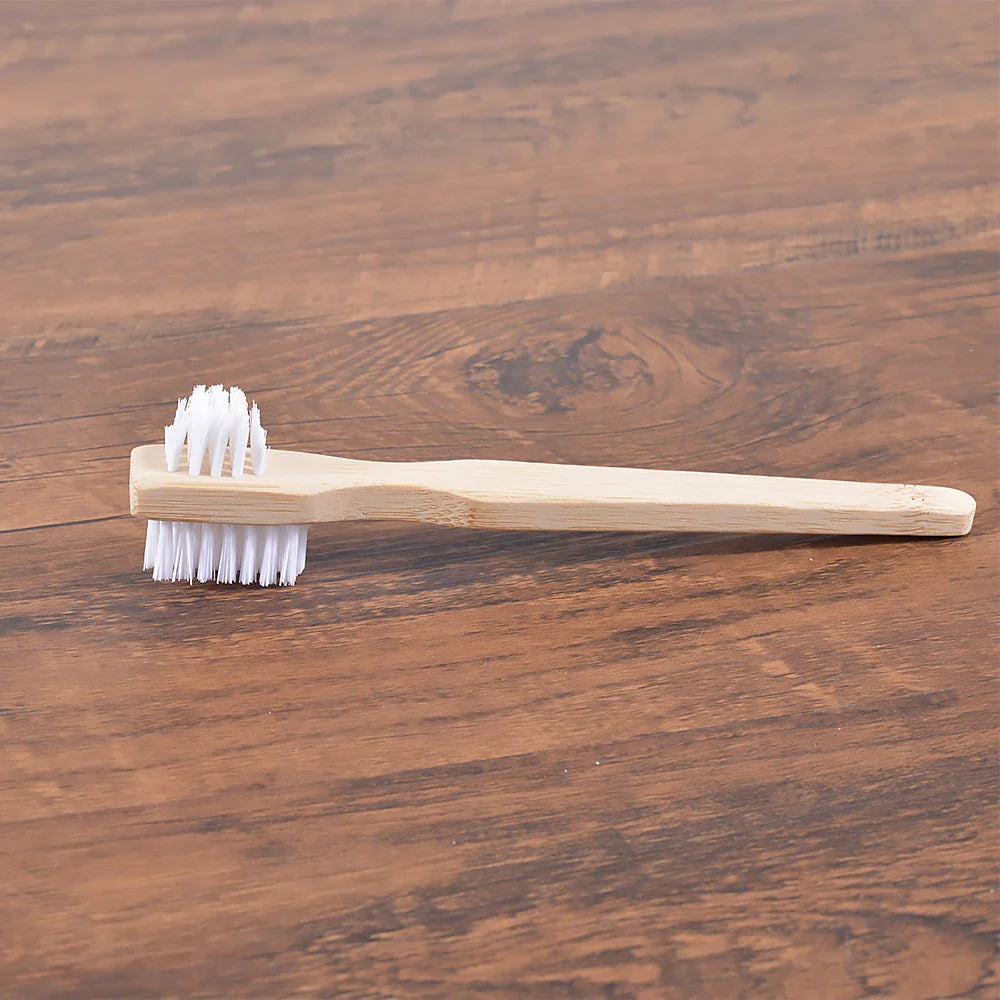Premium Bamboo Denture Cleaning Brush with advanced DuPont bristles for effective plaque removal and a sparkling clean denture