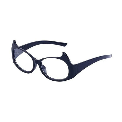 Stylish cat-eye sunglasses with oversized frames, semi-rimless design, and punk-inspired detailing for a timeless, glamorous look
