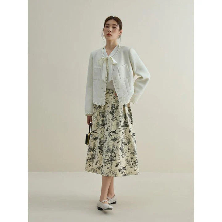 Premium polyester A-line midi skirt with unique ink animal print, designed for stylish winters.