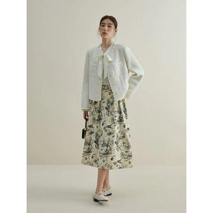 Premium polyester A-line midi skirt with unique ink animal print, designed for stylish winters.