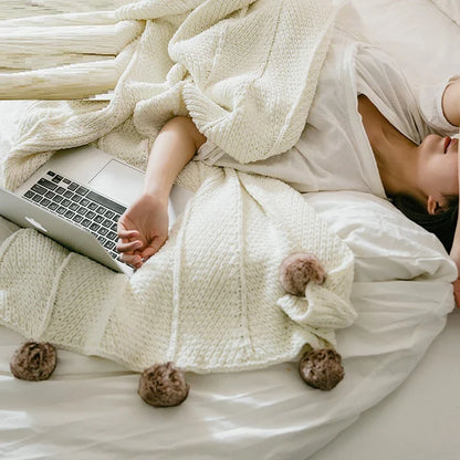 Cozy chenille ball-knit wool blanket in pink, gray, and white colors