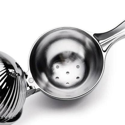 Manual citrus juicer made of stainless steel with an ergonomic handle for easy and efficient juice extraction
