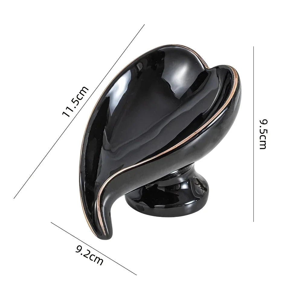 Elegant ceramic leaf-shaped soap dish with a heart design, perfect for adding a touch of nature-inspired luxury to your bathroom decor
