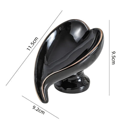 Elegant ceramic leaf-shaped soap dish with a heart design, perfect for adding a touch of nature-inspired luxury to your bathroom decor
