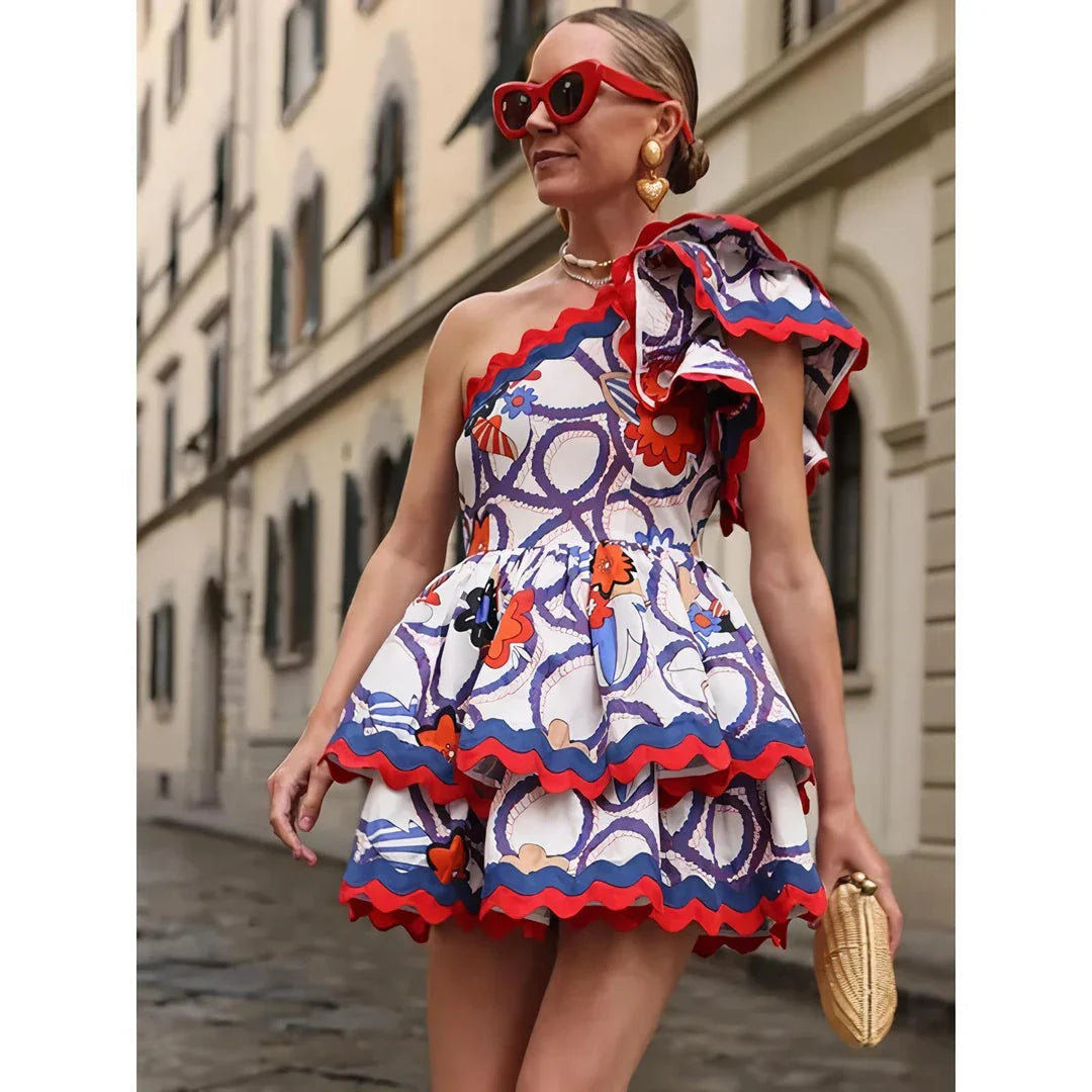 Fashionable sleeveless mini dress with ruffled details and vibrant floral print