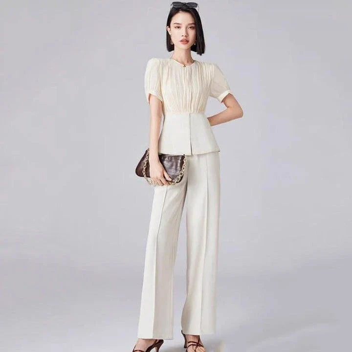 Elegant long sleeve top and wide leg pants set in solid color for stylish autumn wear