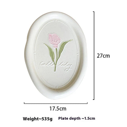 Elegant ceramic plate with French-inspired Calla Tulip floral relief pattern, perfect for formal and casual dining settings