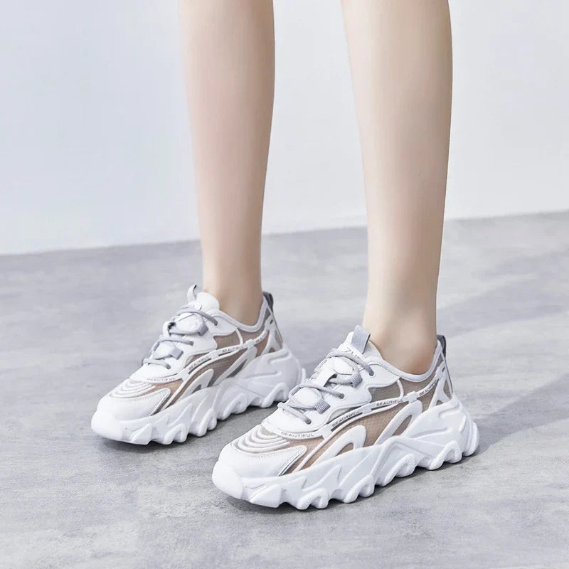 Premium white platform sneakers with thick soles, showcasing a trendy 'daddy shoe' style for comfortable and stylish everyday wear.