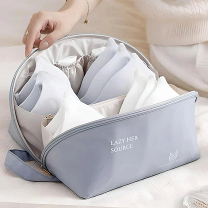 Compact travel underwear and lingerie organizer bag made of durable polyester for organized storage of bras, underwear, and socks while on the go.