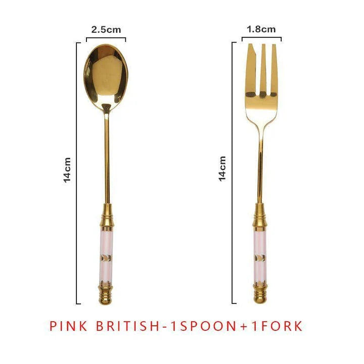 Elegant vintage gold and ceramic coffee and dessert utensil set with hand-painted handles in pink and blue tones