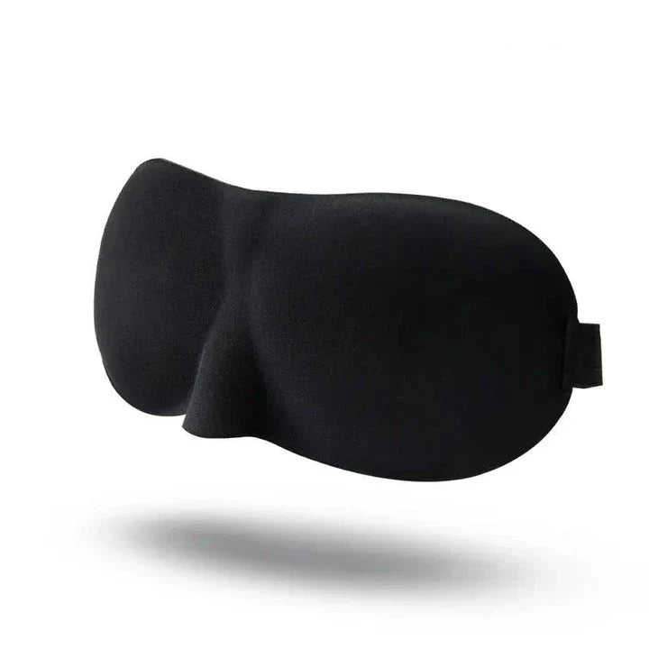 Soft, contoured sleep mask with memory foam construction for comfortable, uninterrupted sleep