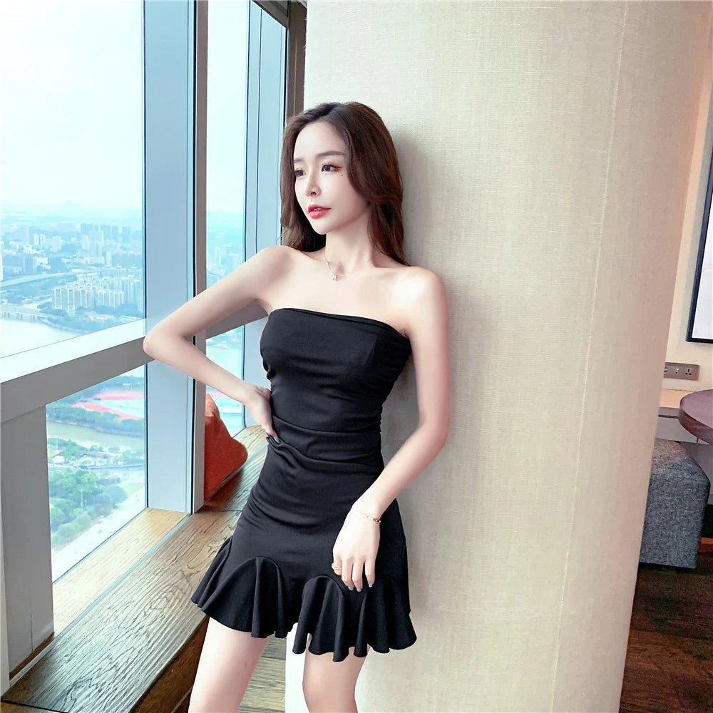 Off-the-shoulder tube top dress with ruffled hip wrap, available in black and lake blue colors